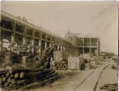 Vista construcció Paperera Espanyola naus acopi de material anys 1920
